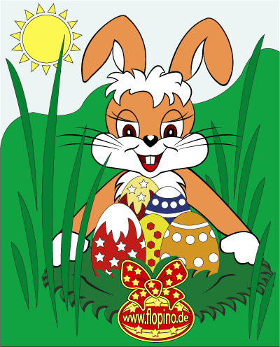 Osterhase versteckt ein Osternest mit bunten Ostereiern im Gras